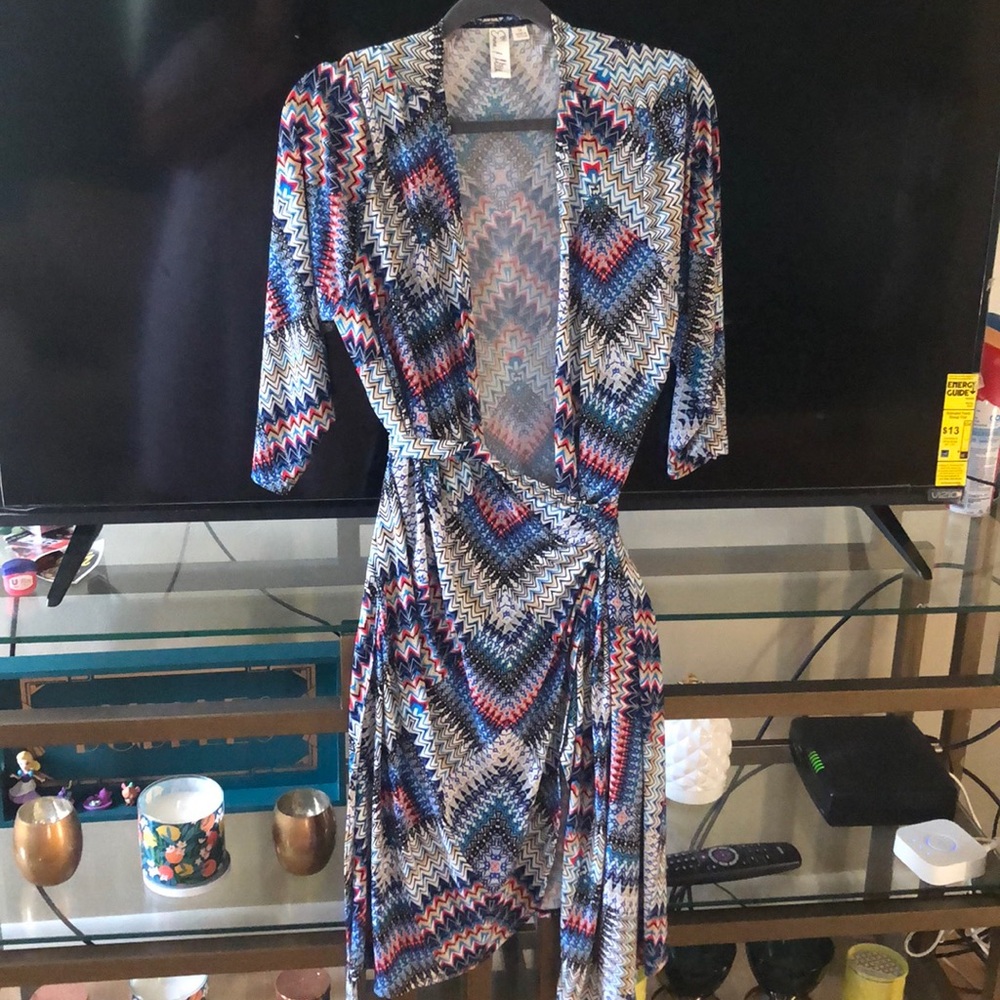 Knee length, geometric print wrap dress